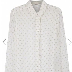 White and gold polka dot shirt